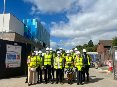 Eddie with local residents on a tour of the site